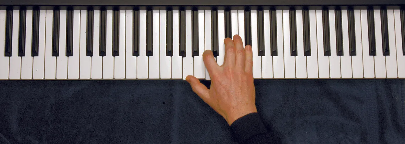 Adim7 chord played on a piano — hand position on the keys
