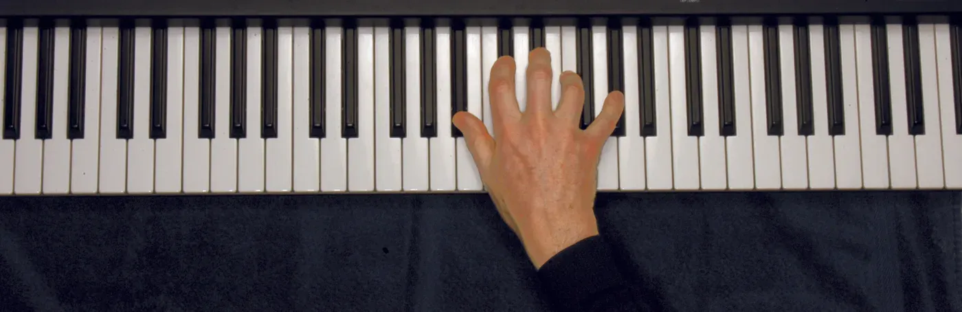 Bbm7 chord played on a piano — hand position on the keys