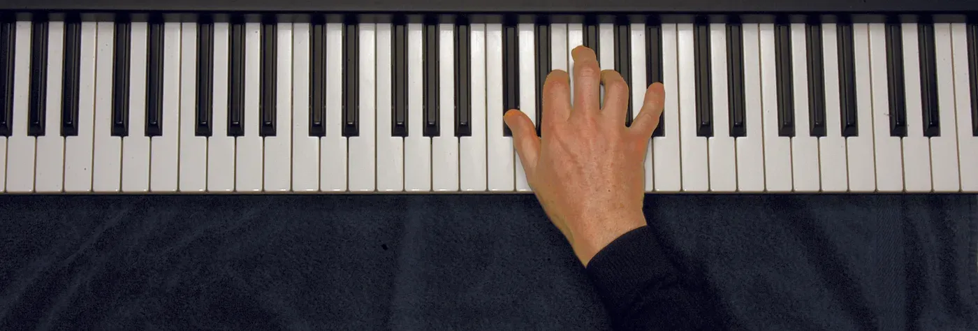 Dbdim7 chord played on a piano — hand position on the keys